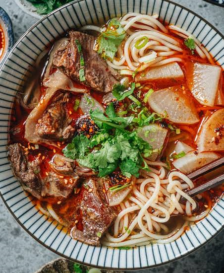 Lanzhou Chinese Beef Noodles restaurant on Food Street in Bahria Town Phase 7 Rawalpindi serving authentic hand pulled beef noodles Chinese soups fried rice dumplings and traditional Chinese cuisine